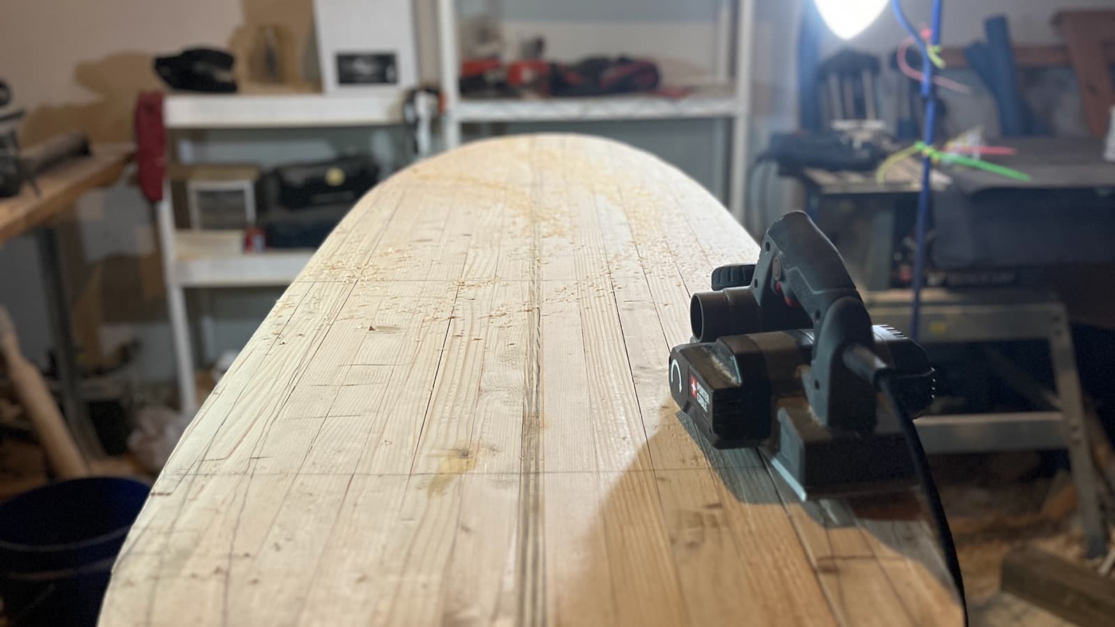 A wooden blank on the shaping stand in the workshop